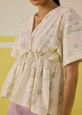 A Model Wearing Multicolor Handwoven Organic Cotton Sweet Sunshine Organic Cotton Peplum Top, curated by Only Ethikal